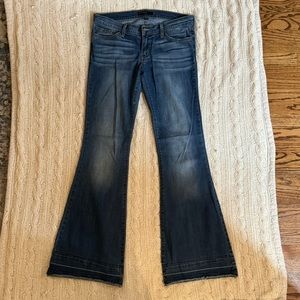 Flying Monkey flare jeans with fringe bottom. Comfy, soft & stretchy. Size 29.